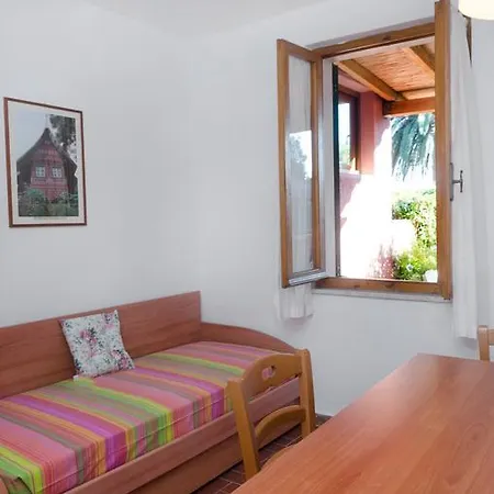 Maria Carla Apartman *
